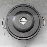 1L non-stick steamer seen from above showing the lid clip and the two side handles