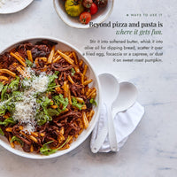 Bowl of pasta with slow-cooked ragu, rocket and parmesan; beyond pizza and pasta, stir Instant Italian Salt into softened butter, whisk it into olive oil for dipping bread, scatter it over a fried egg, focaccia or a caprese, or dust it on sweet roast pumpkin