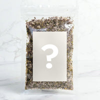Alyce's Lucky Dip Salt: a 100g packet of mystery flavour blend with the label obscured by a question mark, because the flavour is a surprise