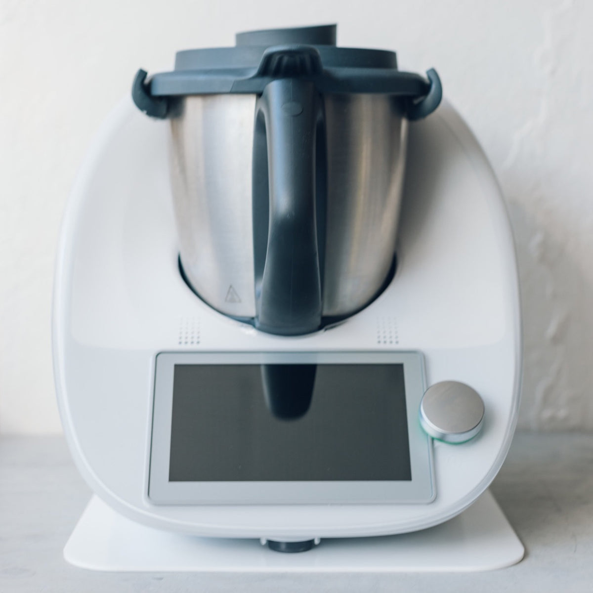 Thermomix front on with the Appliance Mat underneath, showing how little height the mat adds