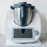 Thermomix front on with the Appliance Mat underneath, showing how little height the mat adds