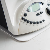 Corner of an older Thermomix TM31 with the Appliance Mat visible beneath its base