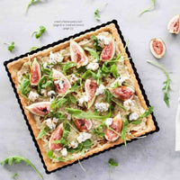 Square cream cheese pastry tart topped with figs, rocket and goat's cheese, made with the creamed onions recipe from the Champagne Breakfast Class Booklet