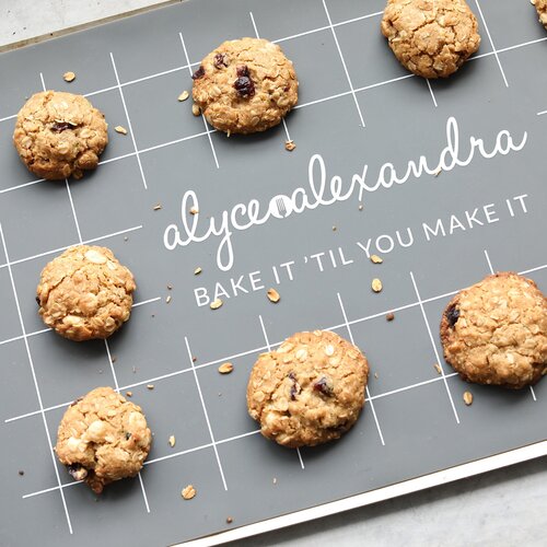 Silicone Baking Mats with freshly baked choc chip cookies