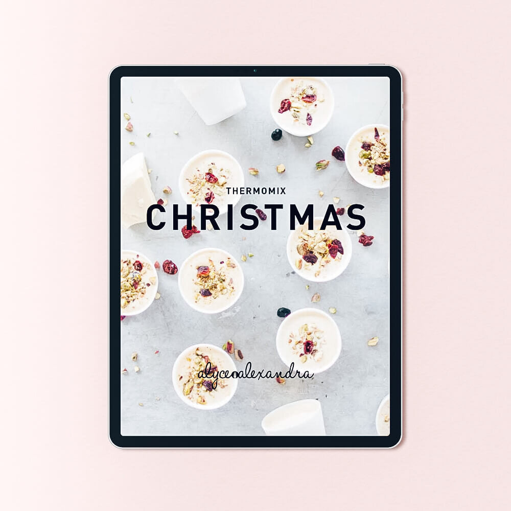 Christmas Class Booklet for Thermomix machines shown on a tablet, the cover styled with pavlova nests and berries