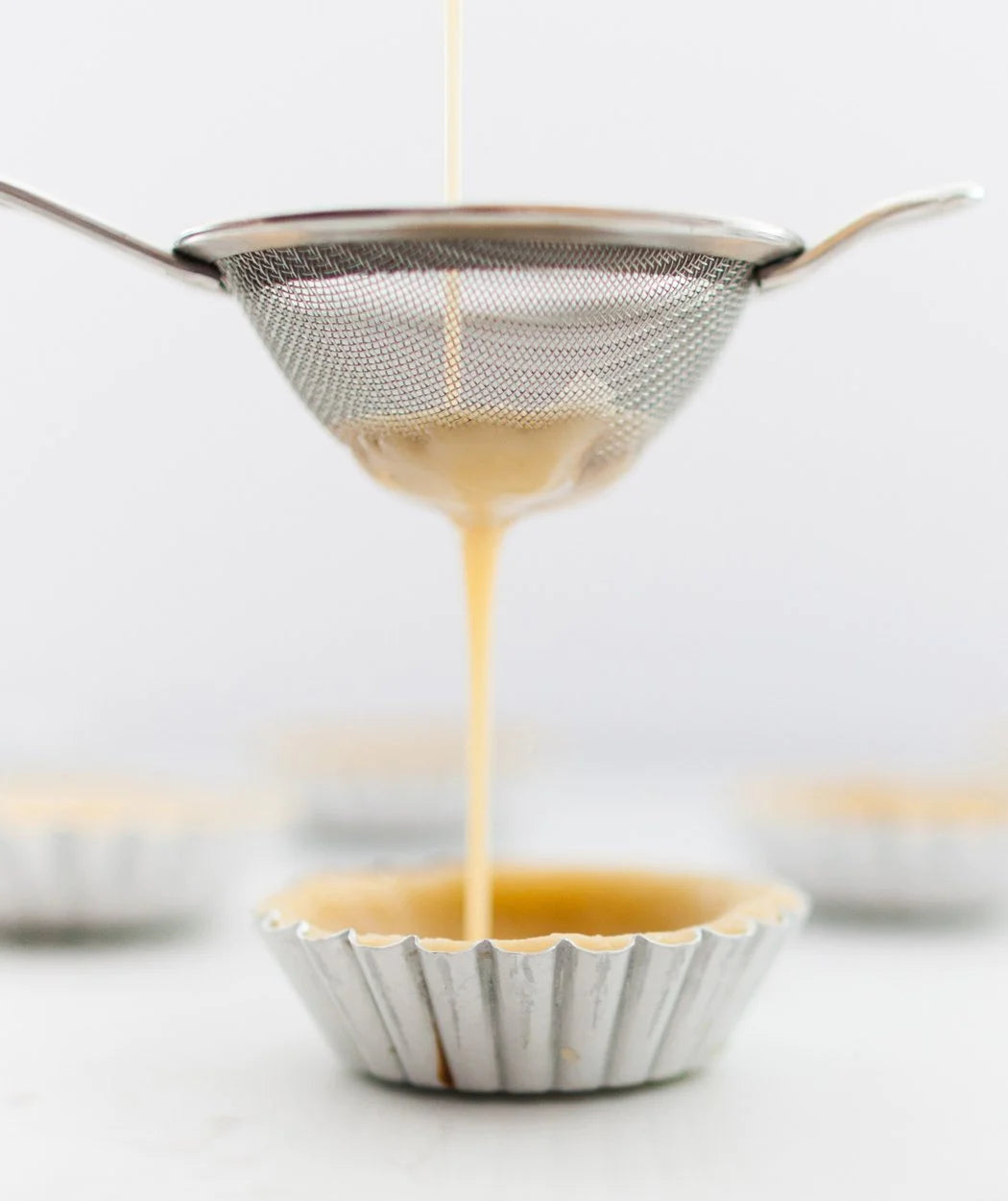 Latte squares scattered on a white surface with coffee beans, from the Class Booklet Bundle