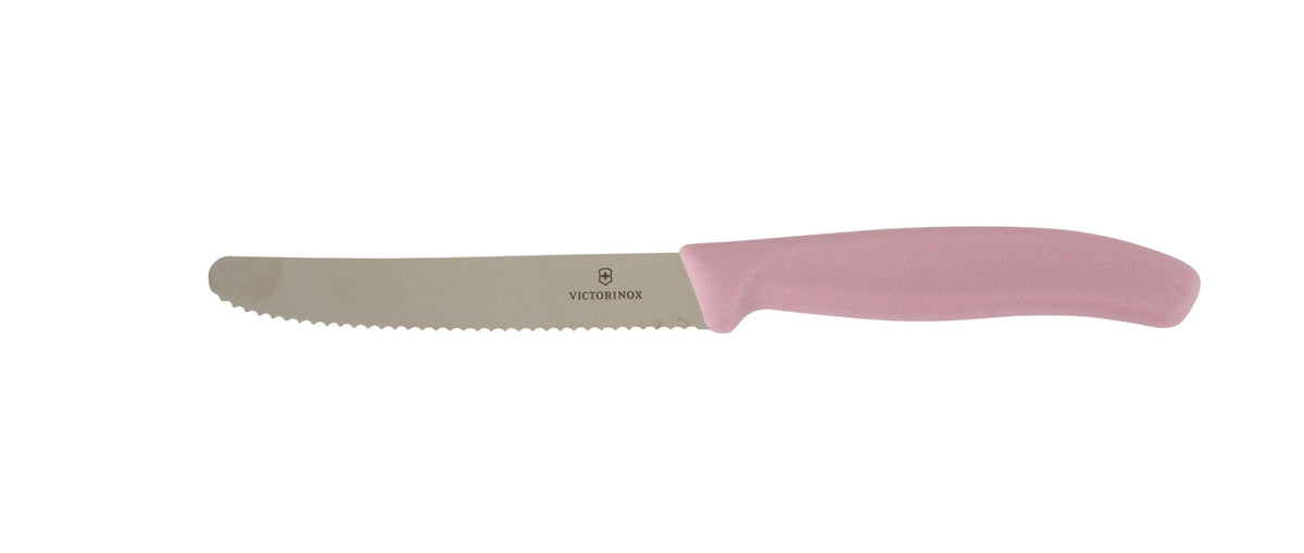 Classic Serrated Knife with a dusty pink handle against a white background