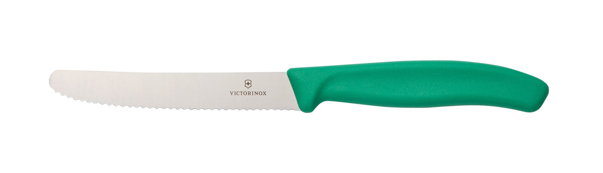 Classic Serrated Knife with a green handle against a white background