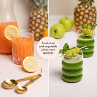 Glass of fresh orange juice and a green apple juice with whole fruit alongside; the Cold-Pressed Juicer makes fresh fruit and vegetable juices very quickly