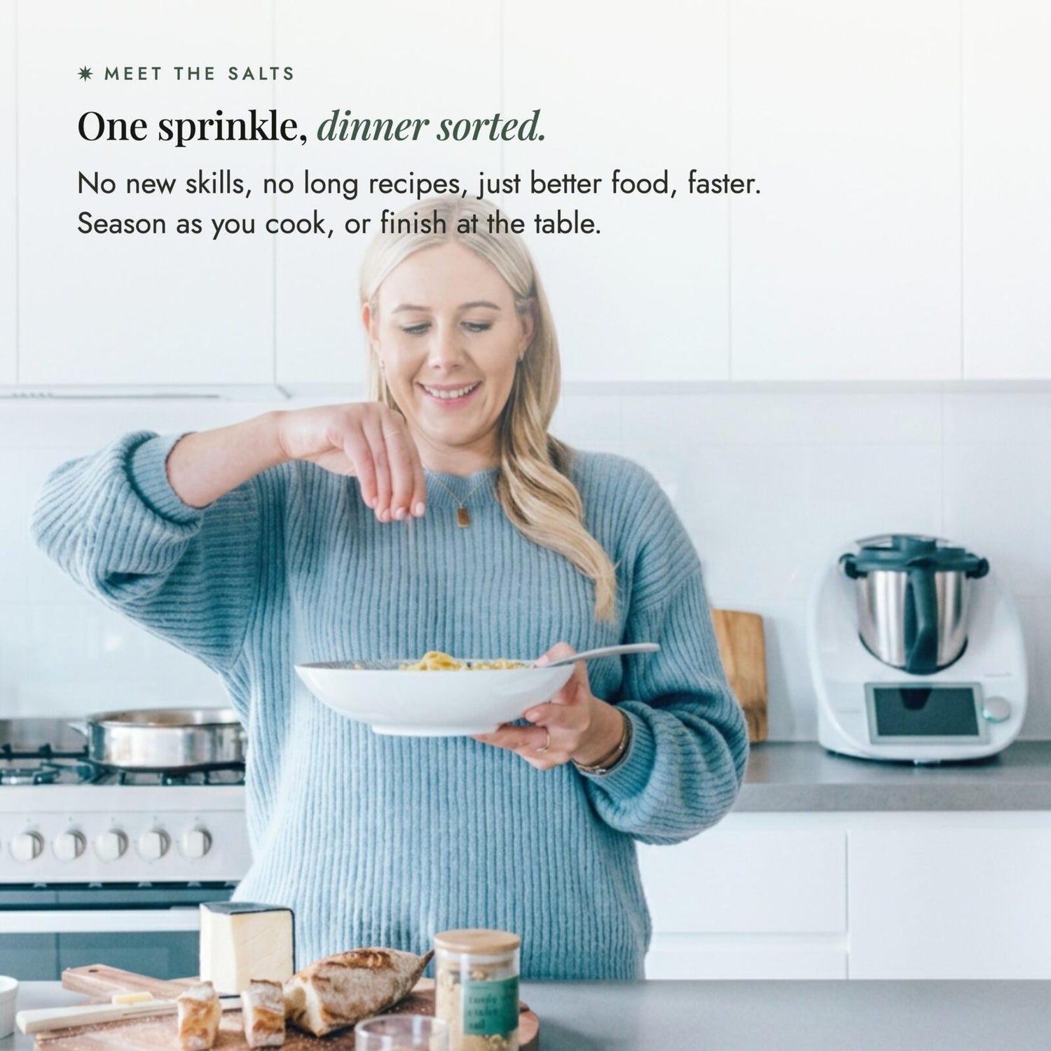 Alyce sprinkling seasoning salt over a bowl of pasta in her kitchen; one sprinkle, dinner sorted, no new skills or long recipes