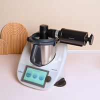 Ice Shaver mounted on a Thermomix on a pale bench, ready to use