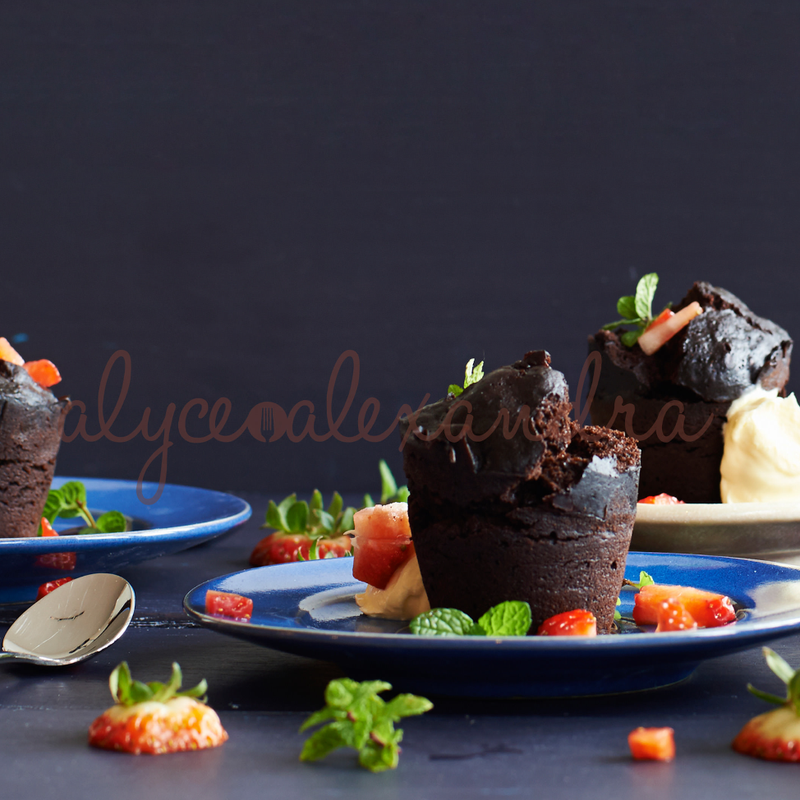 Thermomix Varoma steamed chocolate puddings drizzled with chocolate ganache, cream and toasted nuts