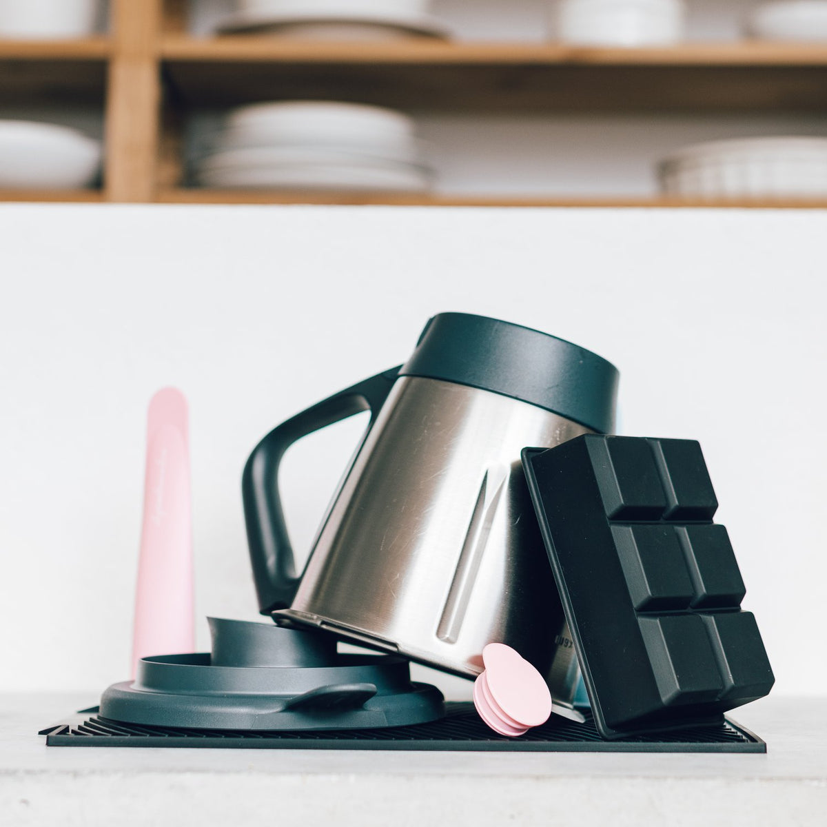 Jumbo Freezer Pods trays stacked with a Thermomix mixing bowl and a silicone spatula alongside