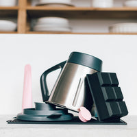 Jumbo Freezer Pods trays stacked with a Thermomix mixing bowl and a silicone spatula alongside
