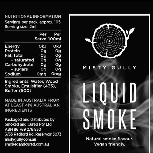 Nutritional and ingredient panel for Misty Gully Liquid Smoke: ingredients are water, wood smoke, emulsifier 433 and buffer 500ii, made in Australia from at least 4% Australian ingredients, with no energy, protein, fat, carbohydrate, sugars or sodium per 2 ml serve