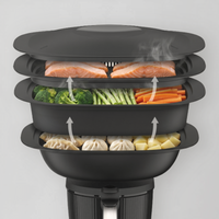 MaxiSteam Extender for Thermomix TM7 Varoma steaming on three levels: salmon, vegetables and dumplings