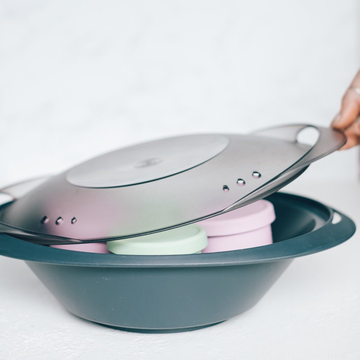 Mini Silicone Pot Containers sitting inside the Thermomix Varoma with the lid lifted off