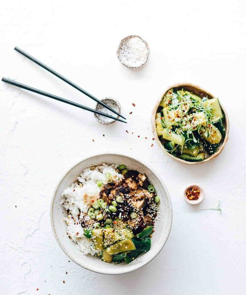 Bowl of slow cooked rice and greens with side dishes, from Modern Slow Cooker