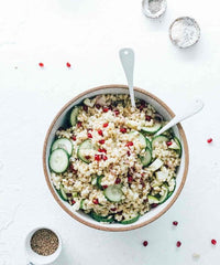 Bowl of slow cooked grains with cucumber and yoghurt, from Modern Slow Cooker
