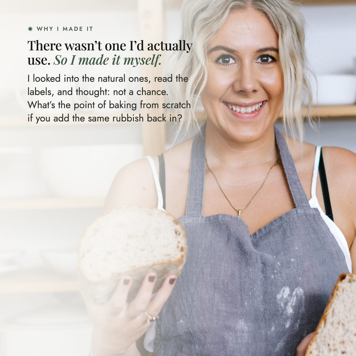 Alyce Alexandra in a linen apron holding a small sourdough loaf in her kitchen, on why she created No-Nasty Bread Improver after reading the labels on the natural improvers already on the market