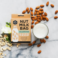 Ever Eco Nut Milk Bag in its pack beside almonds and a bowl of fresh nut milk, with an easy U-shaped design