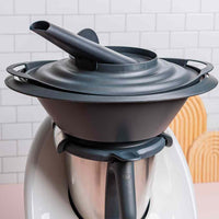 OmniSteam Lid fitted on top of the Thermomix Varoma, its spout directing steam sideways