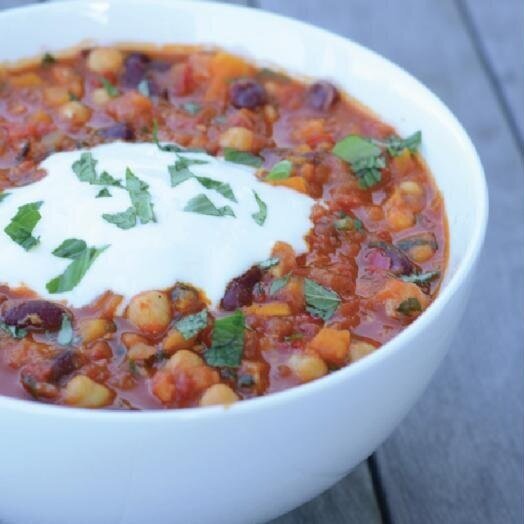 Bowl of vegetable chilli with herbs, from the Quick Fix digital cookbook