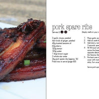 Sticky glazed pork spare ribs on a board, from the Quick Fix digital cookbook