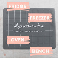 Grey Silicone Baking Mat labelled with its four uses: fridge, freezer, oven and bench