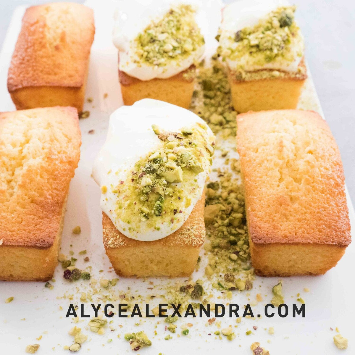Iced pistachio mini loaves on a bench, made in the Silicone Bar Moulds