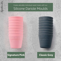 Silicone Dariole Moulds shown in both colourways, Signature Pink and Classic Grey, for individual sweet treats