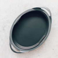 Silicone Steaming Mat for Varoma, a dark grey mat shaped to fit the Thermomix Varoma tray