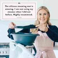 Alyce holding the Varoma with the Silicone Steaming Mat; customer review from Claire: the silicone steaming mat is amazing, I am now using my steamer when I did not before, highly recommend