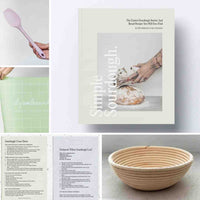 Everything in the Simple Sourdough Complete Kit: the Simple Sourdough cookbook, a rattan proving basket, a spatula, the starter and the printed guides