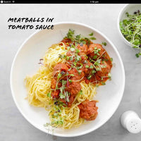Meatballs in tomato sauce served over spaghetti, from Slow Cooker Recipes with Thermomix-Prep Options