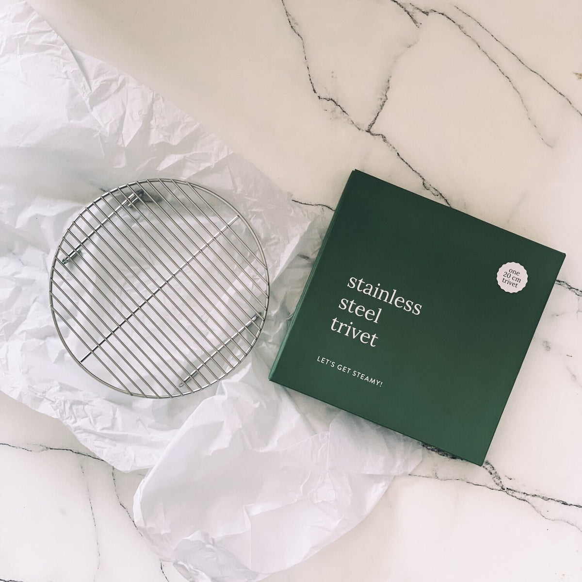 Stainless steel trivet positioned in the Varoma for Thermomix steaming