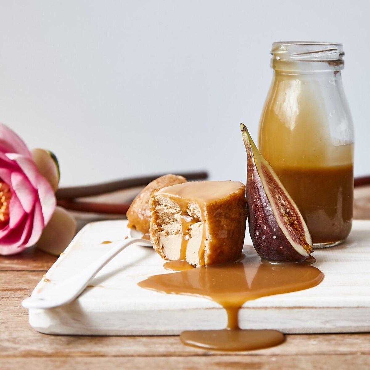 Sticky date pudding with caramel sauce on a board, made using the Starter Kit