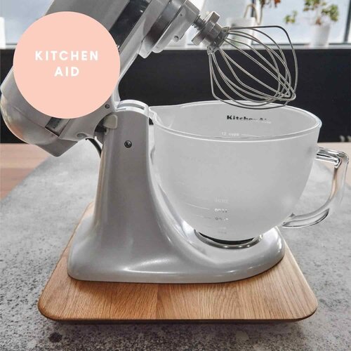 KitchenAid stand mixer sitting on the Thermo Deluxe Slide Board, showing it fits other appliances