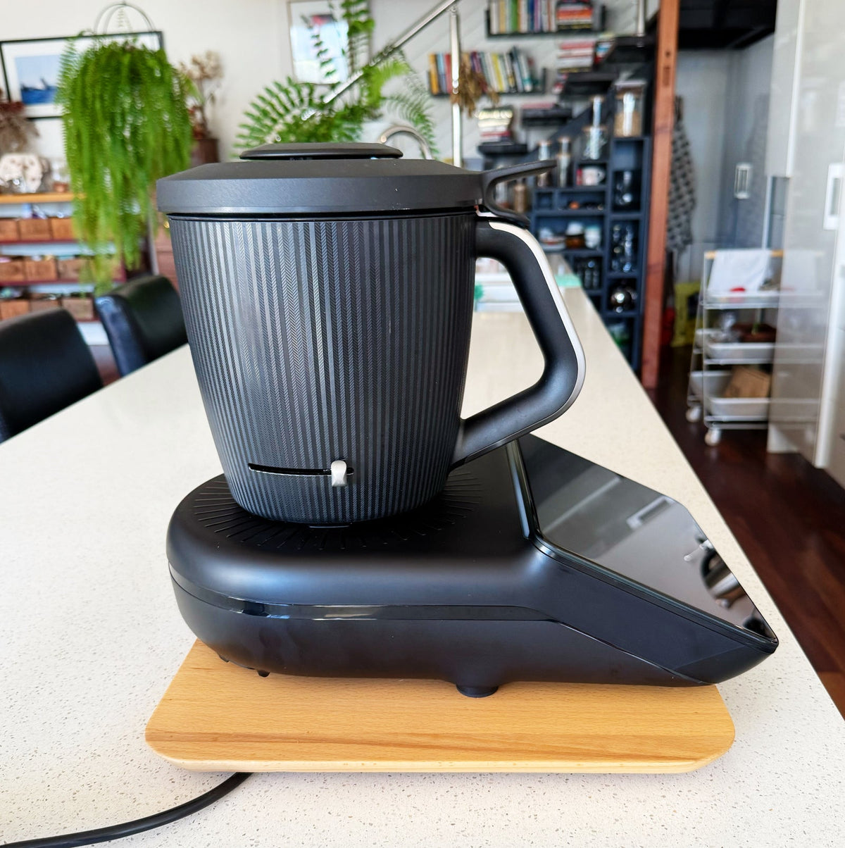 Dark Thermomix on the timber Thermo Deluxe Slide Board in a kitchen