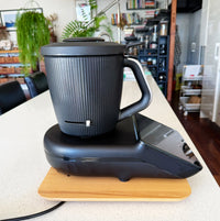 Dark Thermomix on the timber Thermo Deluxe Slide Board in a kitchen