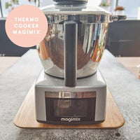 Magimix thermo cooker sitting on the Thermo Deluxe Slide Board
