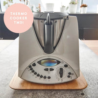 Thermomix TM31 sitting on the Thermo Deluxe Slide Board