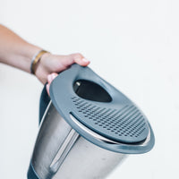 Thermo Lid Strainer seated on the Thermomix bowl, shown from the side