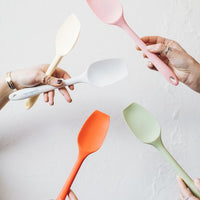 Yellow spoon spatula for Thermomix with individual cheesecakes