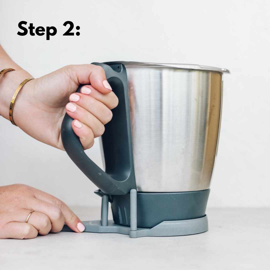 Step 2 of using the TM Twister: turn the handle to loosen the bowl base