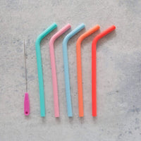 Five Wide Reusable Silicone Straws in mixed colours with the cleaning brush alongside