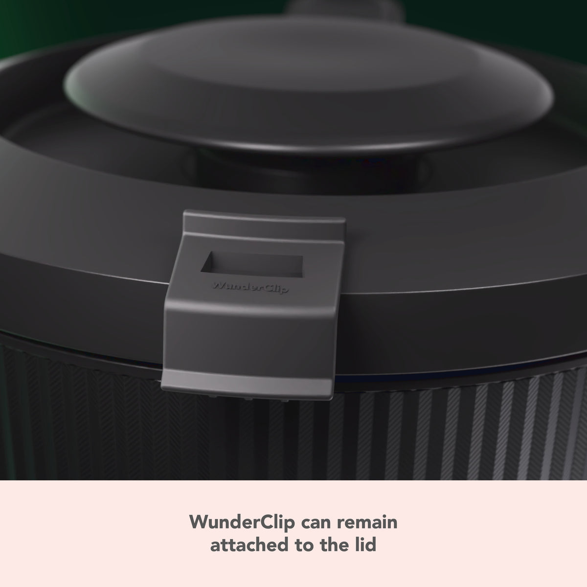 The WunderClip can stay attached to the TM7 lid while cooking