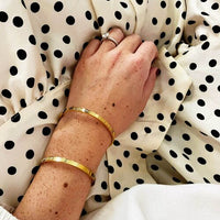 'You've Got This' cuff worn while cooking